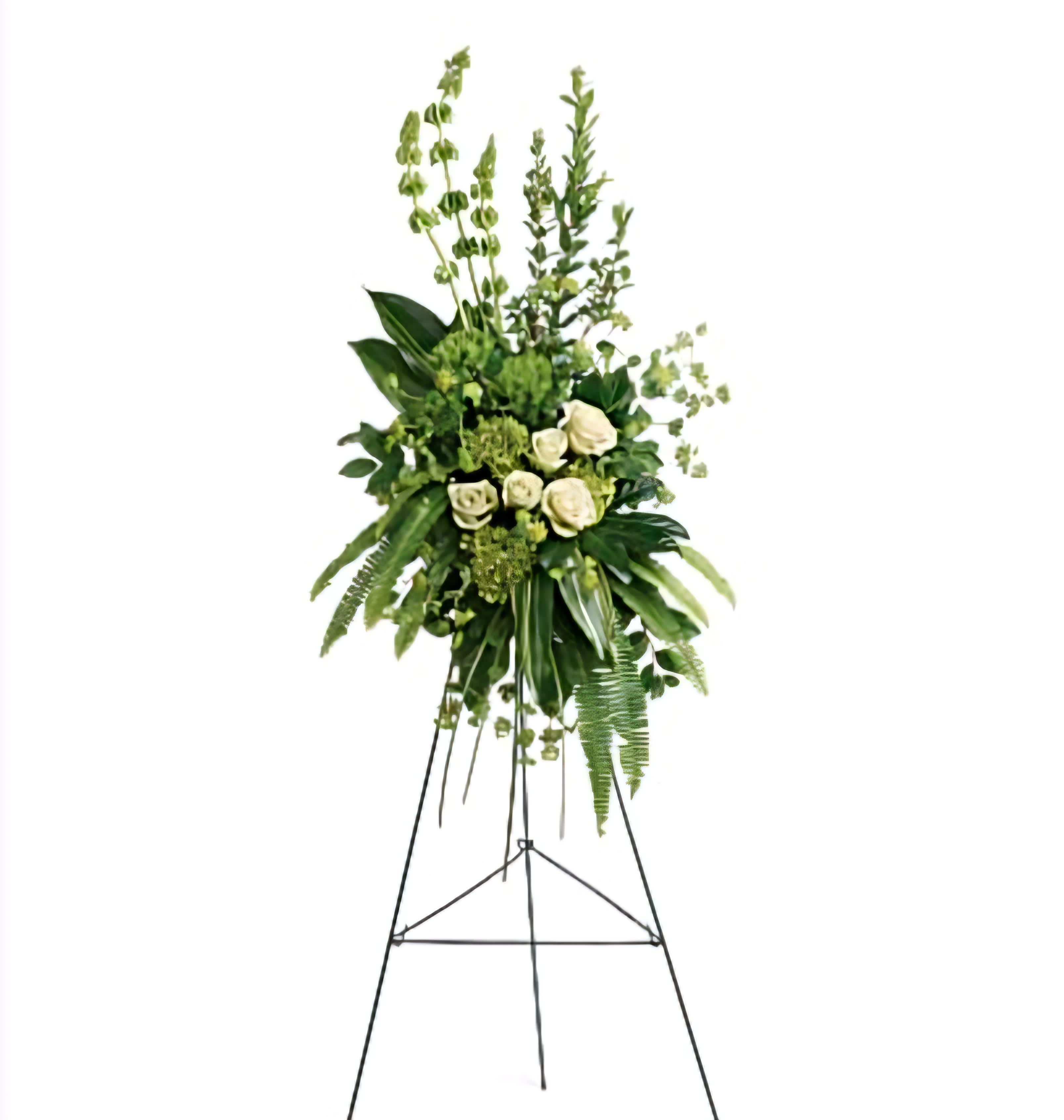  White and green Funeral Standing Spray - Create a serene tribute with our White Funeral Standing Spray, featuring a peaceful arrangement of pristine white flowers, symbolizing purity, reverence, and heartfelt condolences.