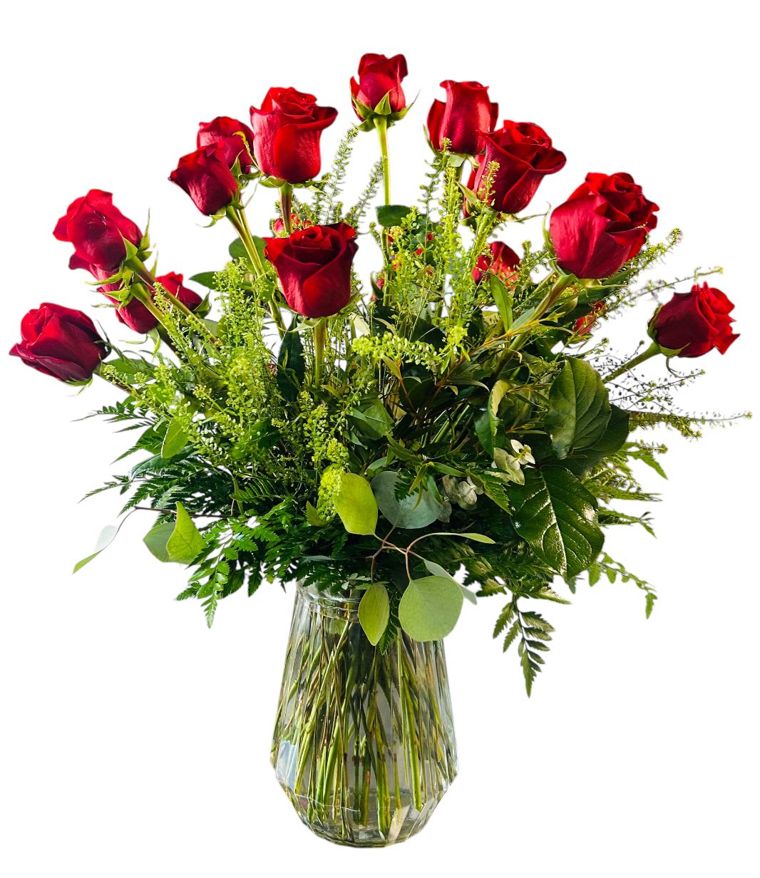 Two Dozen Long Stemmed Roses - Two Dozen Red Roses in a Clear Glass Vase  This stunning two dozen red roses arrangement features twenty-four premium long-stem red roses artfully arranged with lush seasonal greenery in a clear glass vase. Overflowing with beauty and romance, red roses symbolize deep love, passion, and devotion, making this bouquet an unforgettable statement for Valentine’s Day, anniversaries, milestone celebrations, or grand romantic gestures.  Designed by professional florists, this luxurious red rose arrangement offers a full, dramatic presentation that instantly elevates any space. Perfect for expressing heartfelt love or making a lasting impression, this two dozen red roses bouquet is a timeless choice for those moments that deserve something truly special.  Available for local flower delivery and same-day delivery when available.