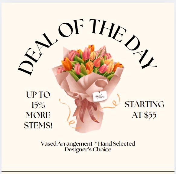 Bouquet of multicolored tulips wrapped in pink paper