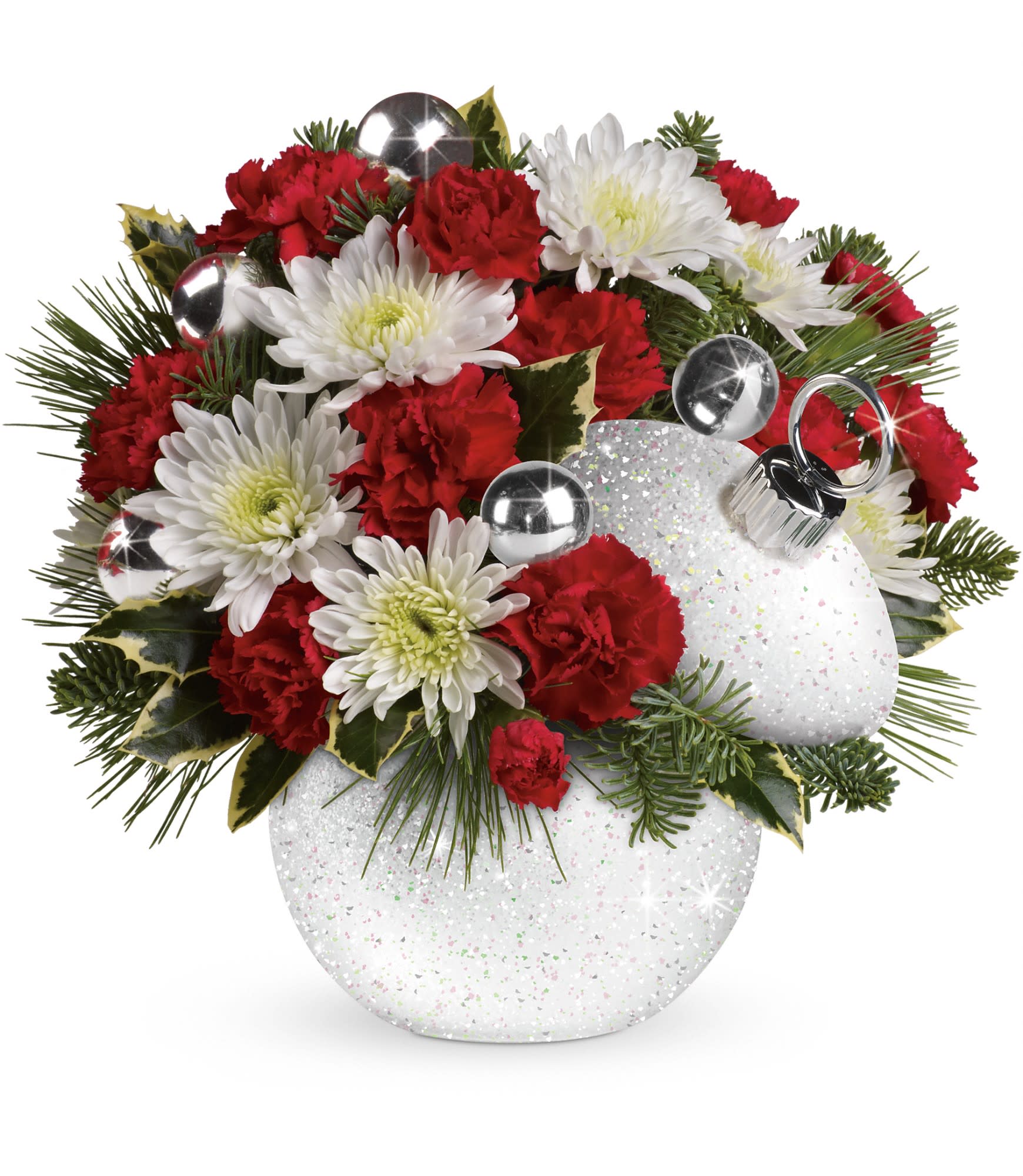 Teleflora's Snowball Surprise Bouquet - Red miniature carnations and white cushion spray chrysanthemums are accented with tips of white pine, noble fir and holly. Delivered in a glitter-covered Shimmering Snow ornament jar. Approximately 11 1/2" W x 10 3/4" H.  T12X410A