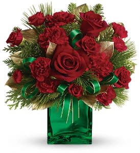 Teleflora's Yuletide Spirit Bouquet - Capture the spirit of the holidays with this gorgeous arrangement. Red roses arrive in our festive green mirrored cube.  Red roses, spray roses, carnations and miniature carnations are accented with assorted greens. Delivered in Teleflora's green mirrored cube.  Approximately 12" W x 12 3/4" H  Orientation: One-Sided  As Shown : TWR02-1A Deluxe : TWR02-1B Premium : TWR02-1C
