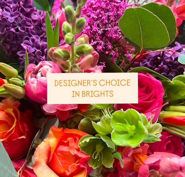 Bright mixed bouquet with pink, purple, orange, and green blooms
