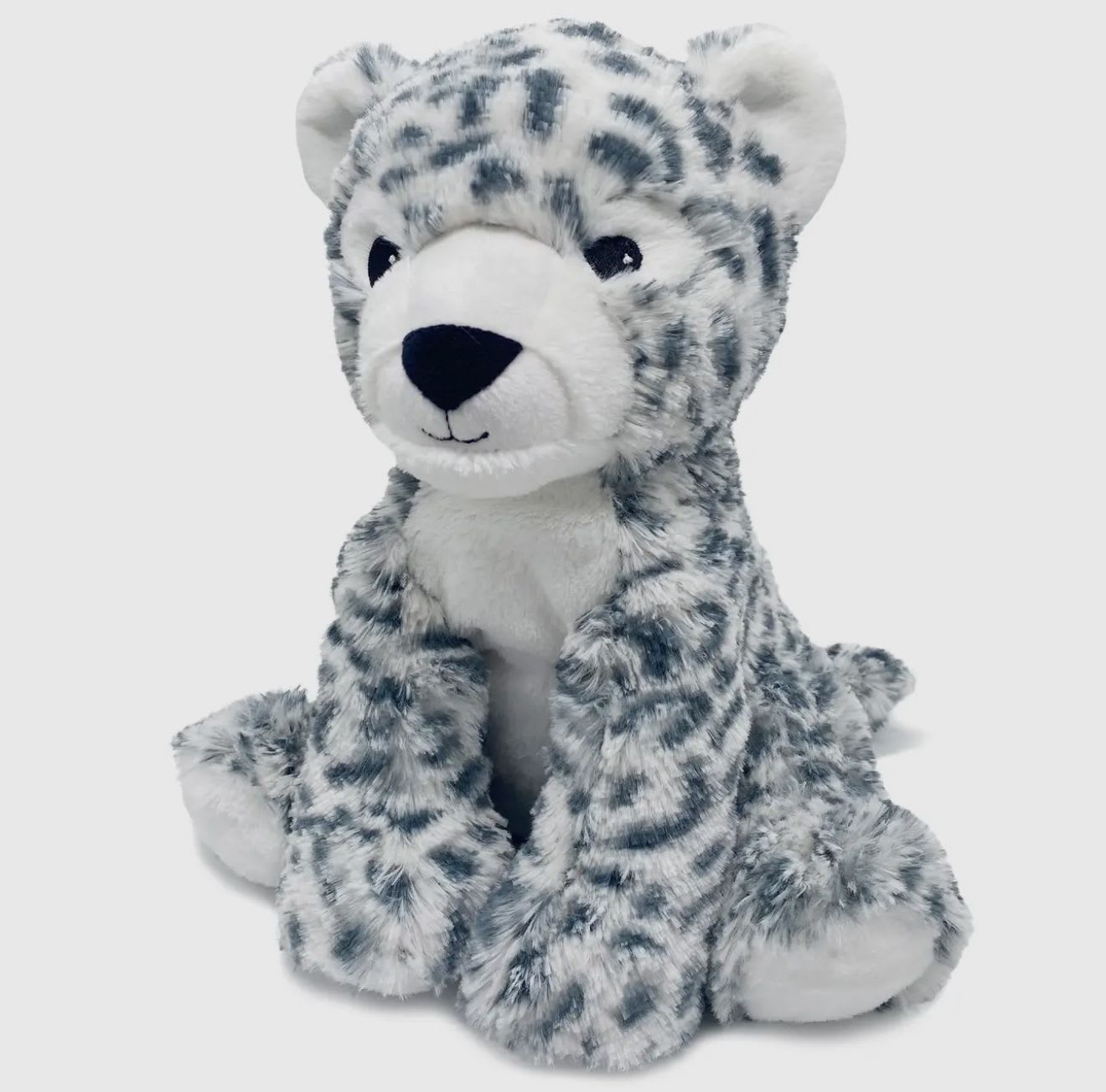 Plush snow leopard stuffed animal sitting on a white background