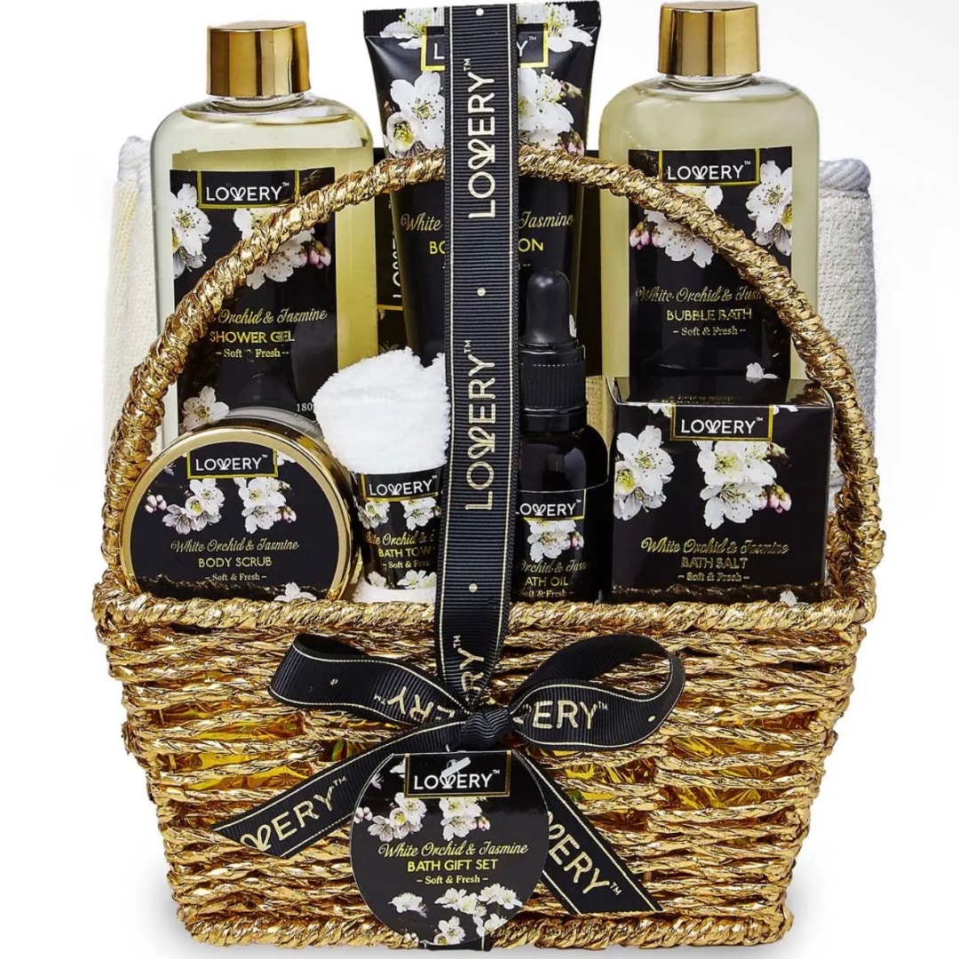 Bath gift set in a gold basket with orchid and jasmine products