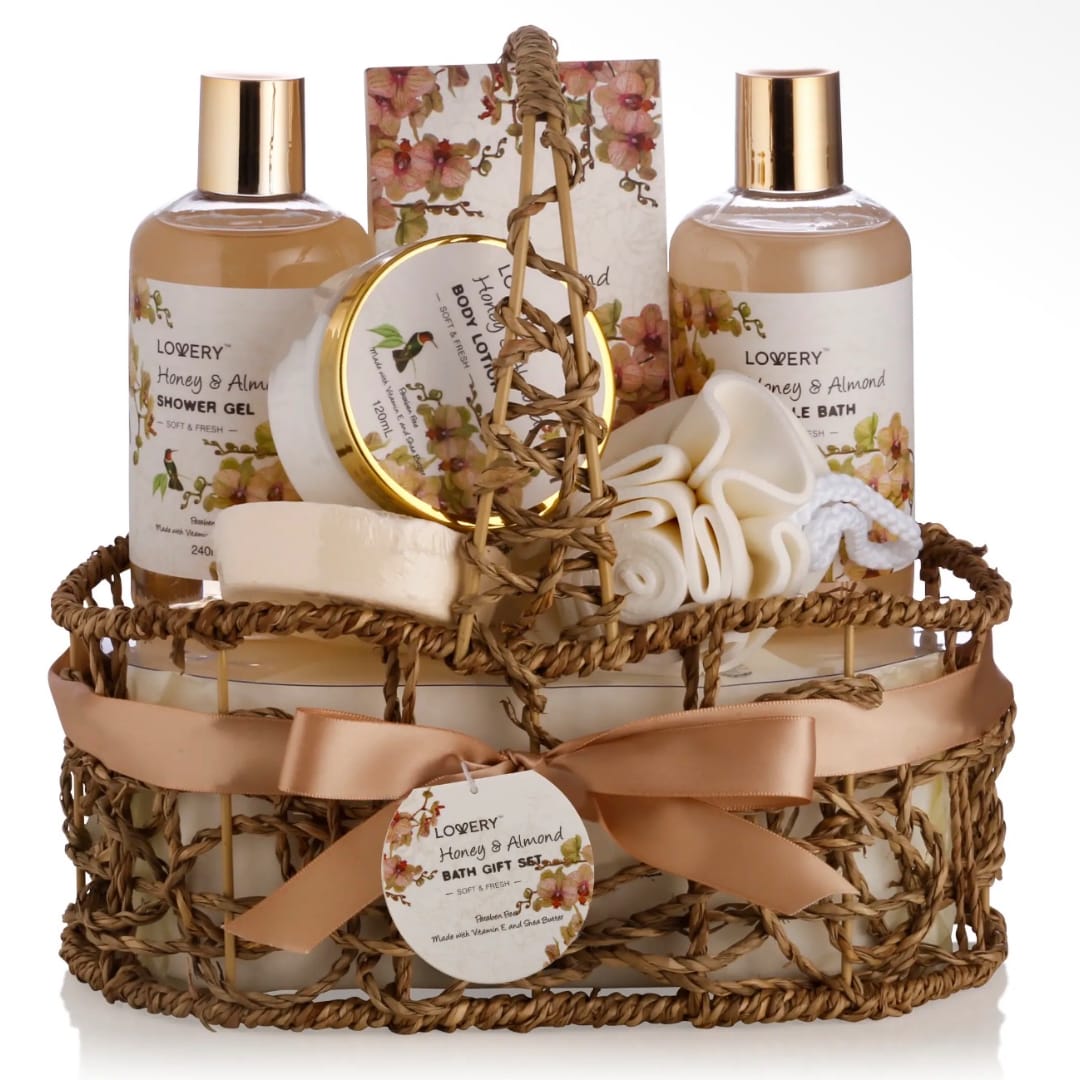 Bath gift set in a woven basket with bottles and a ribbon bow