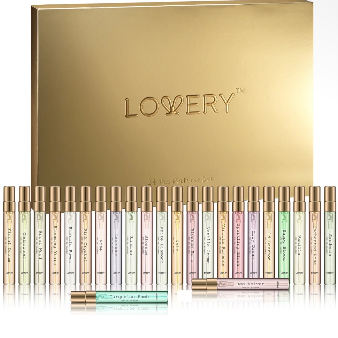 Gold perfume gift set with multiple small fragrance vials arranged in front of a box