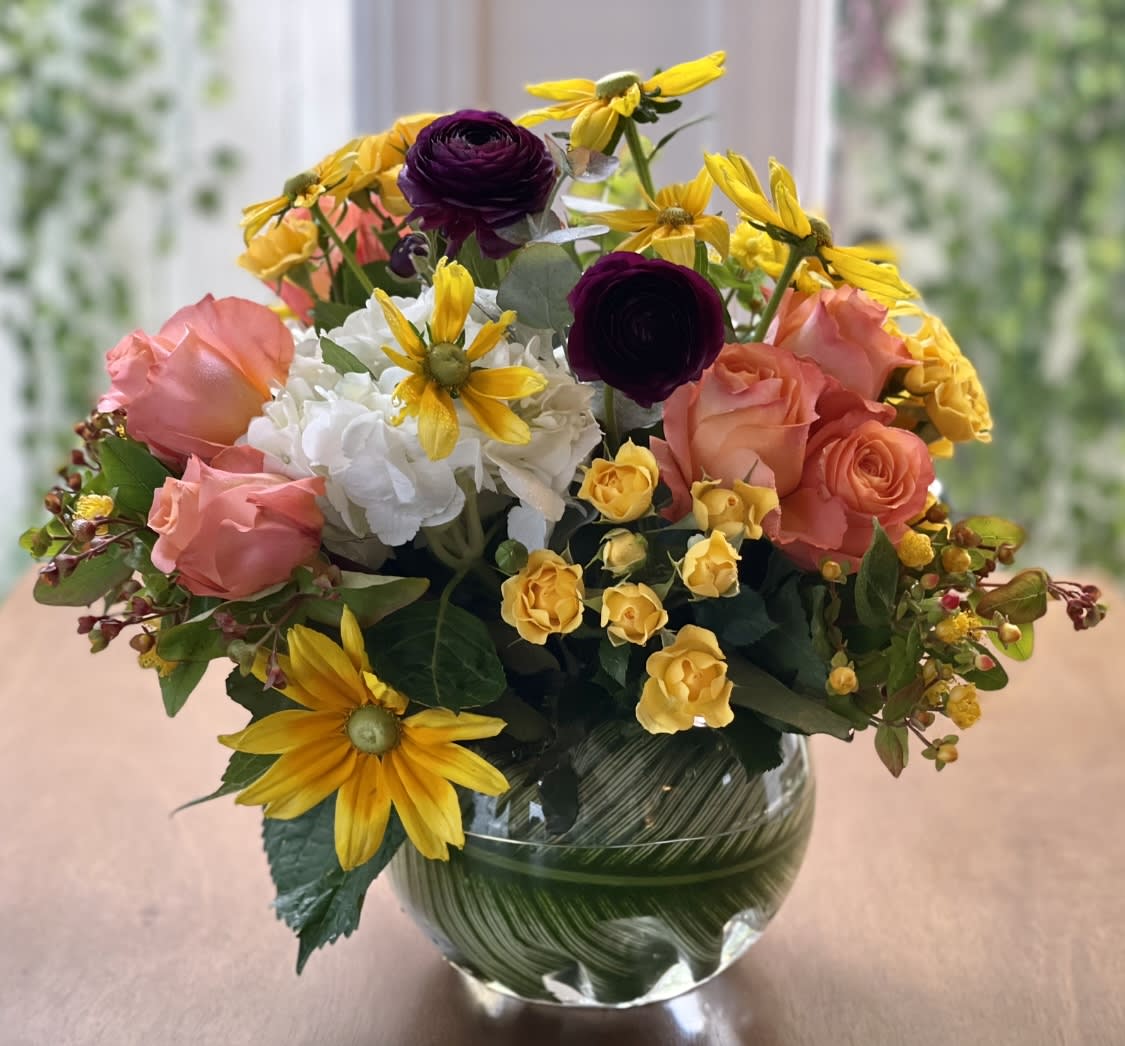 TUSCAN SUN - Bright, joyful, and full of desert charm — Tuscan Sun is a stunning arrangement featuring a harmonious blend of creamy orange sherbet roses and deep purple ranunculus, artfully arranged to capture the essence of a sun-drenched Tuscan landscape. This bouquet brings a touch of warmth and elegance to any setting.​  Available for same-day delivery in San Diego, this arrangement is a favorite among customers searching for vibrant floral arrangements, desert-inspired bouquets, or elegant flower deliveries.​