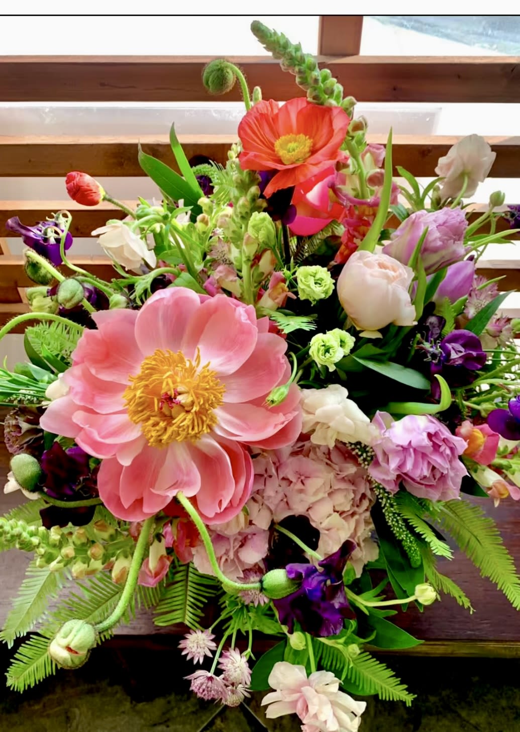 Colorful mixed bouquet with large pink blooms and purple flowers