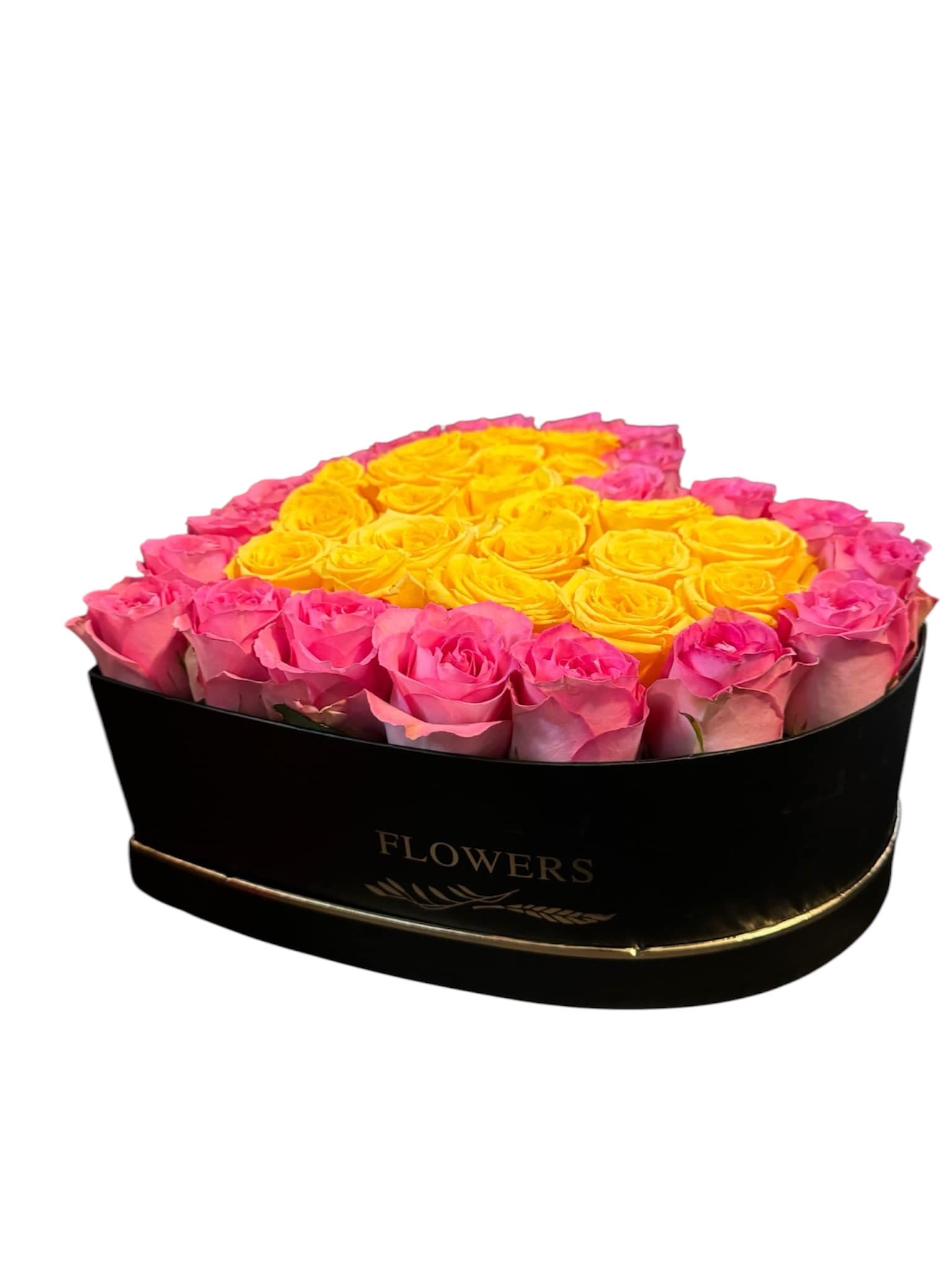 Pink and yellow roses arranged in a black heart-shaped box