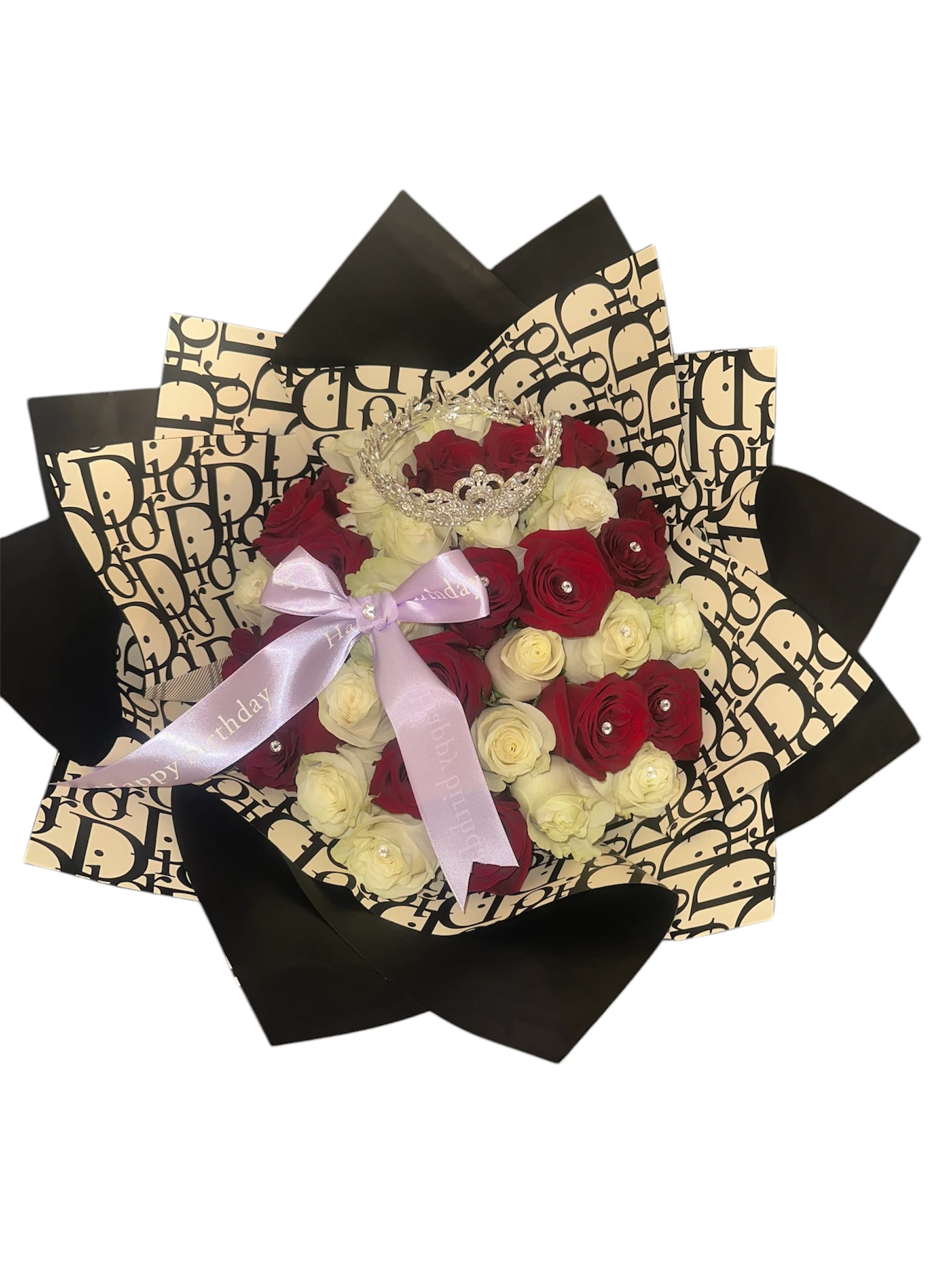 Red and white rose bouquet with a ribbon and jeweled crown topper