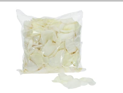 Bag of ivory rose petals with a few loose petals scattered in front