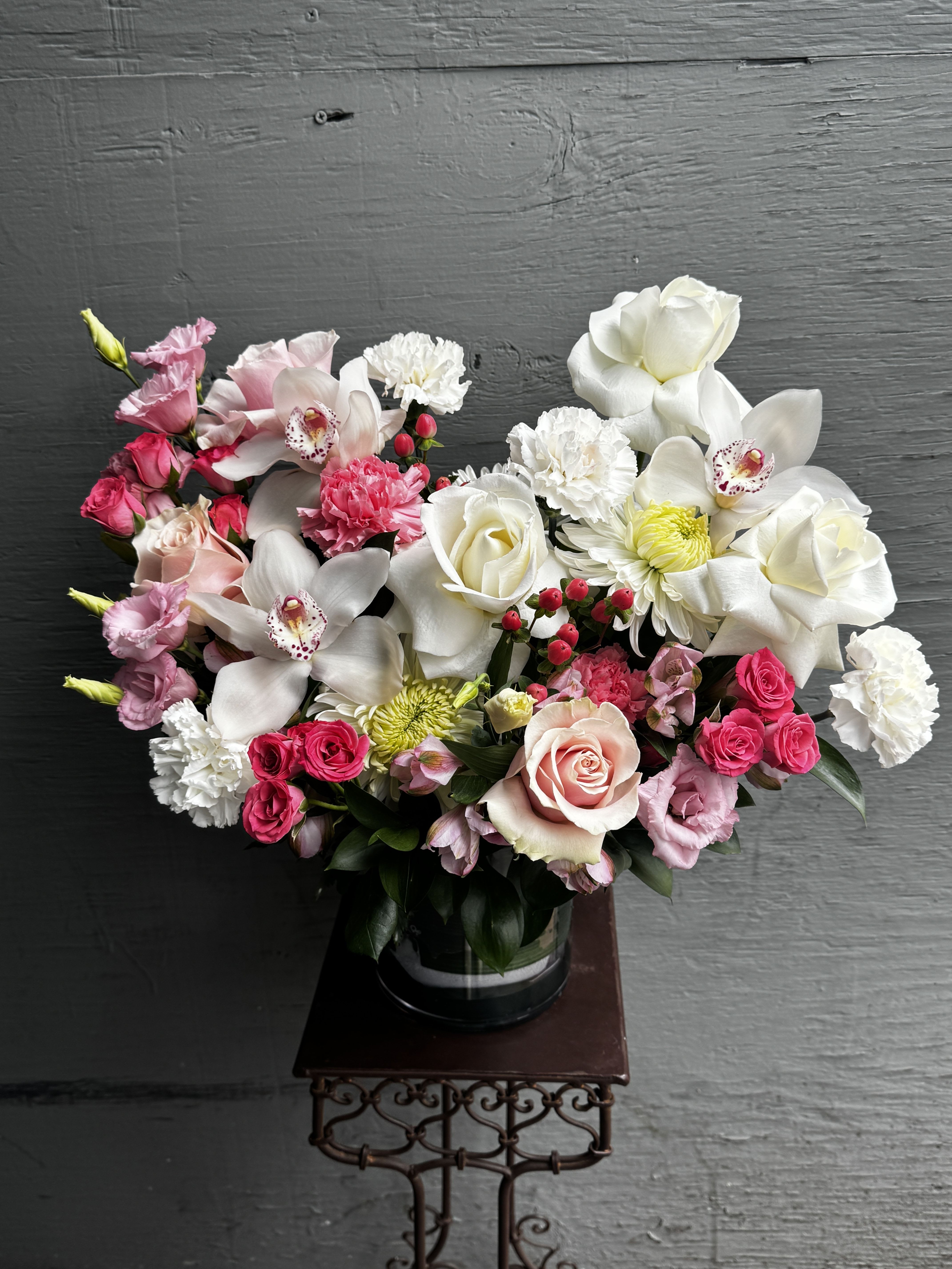 Pink and white mixed bouquet in a glass vase