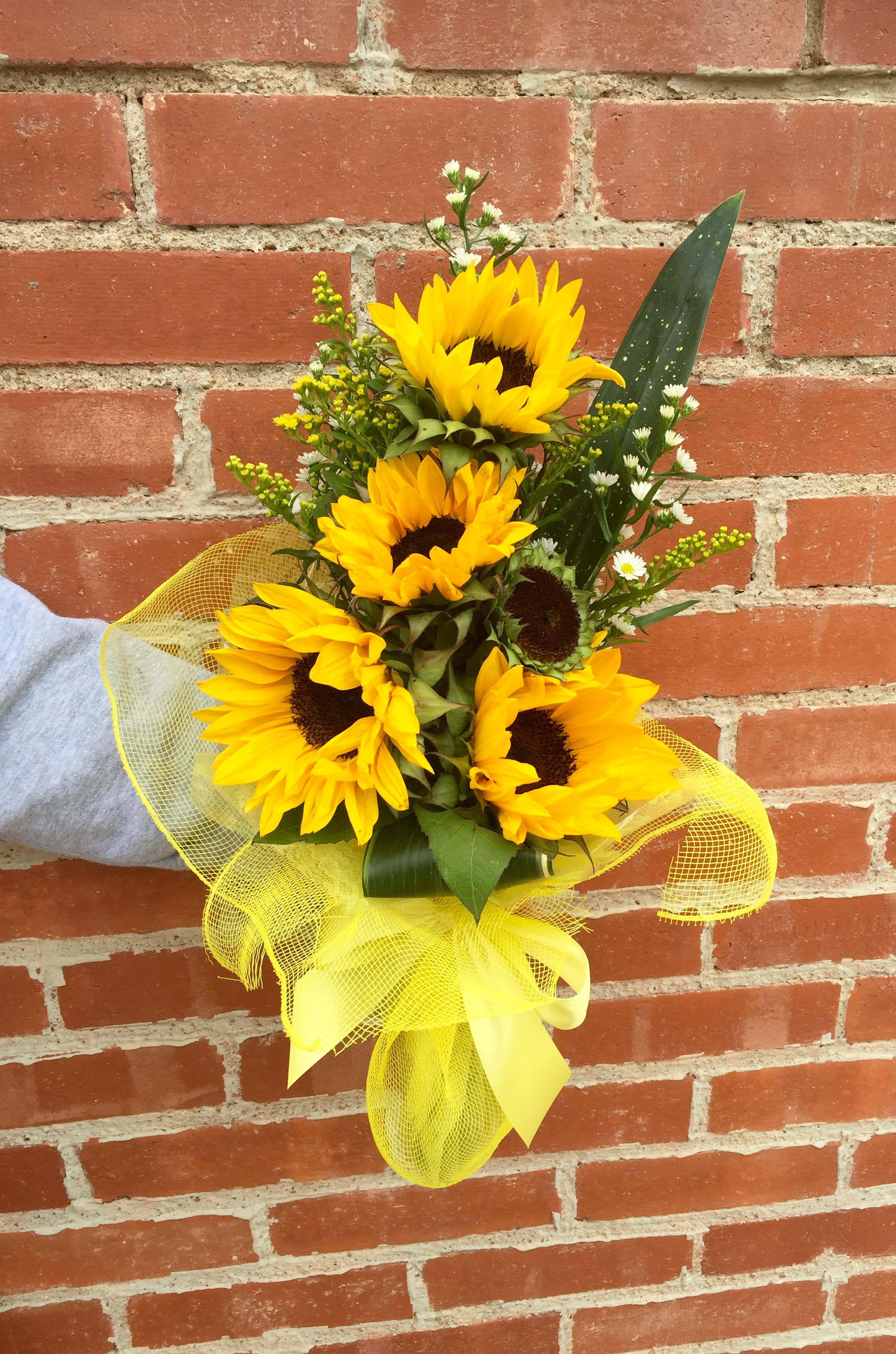 Wrapped Sunflowers For Presentation In Pratt Ks The Flower Shoppe