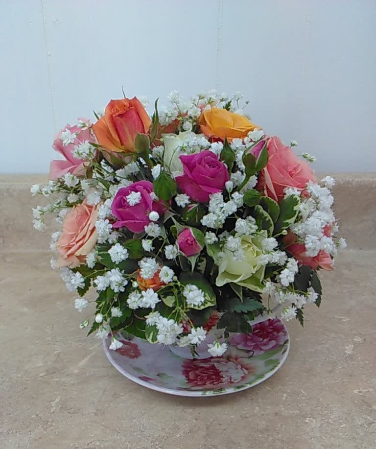 A Tea Cup Full Of Roses By Eagledale Florist
