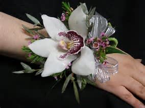 Corsage With White Cymbidium Orchid In San Diego Ca Del Mar Floral Gifts