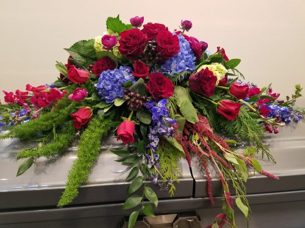 Rich Casket Spray By Bloomique Flower Studio