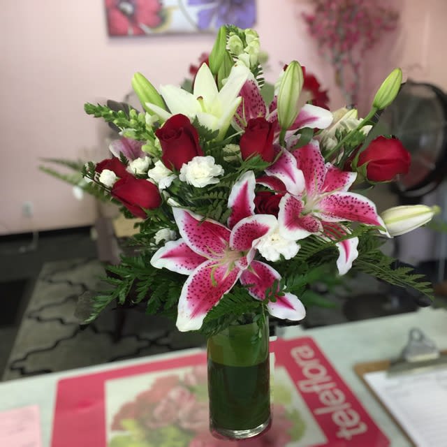 Roses Stargazers Carnations By Rosemantico Flowers