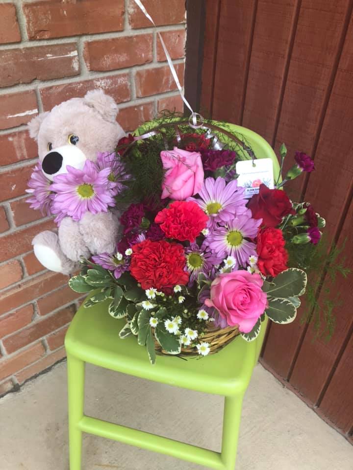 beautiful flowers with teddy bear