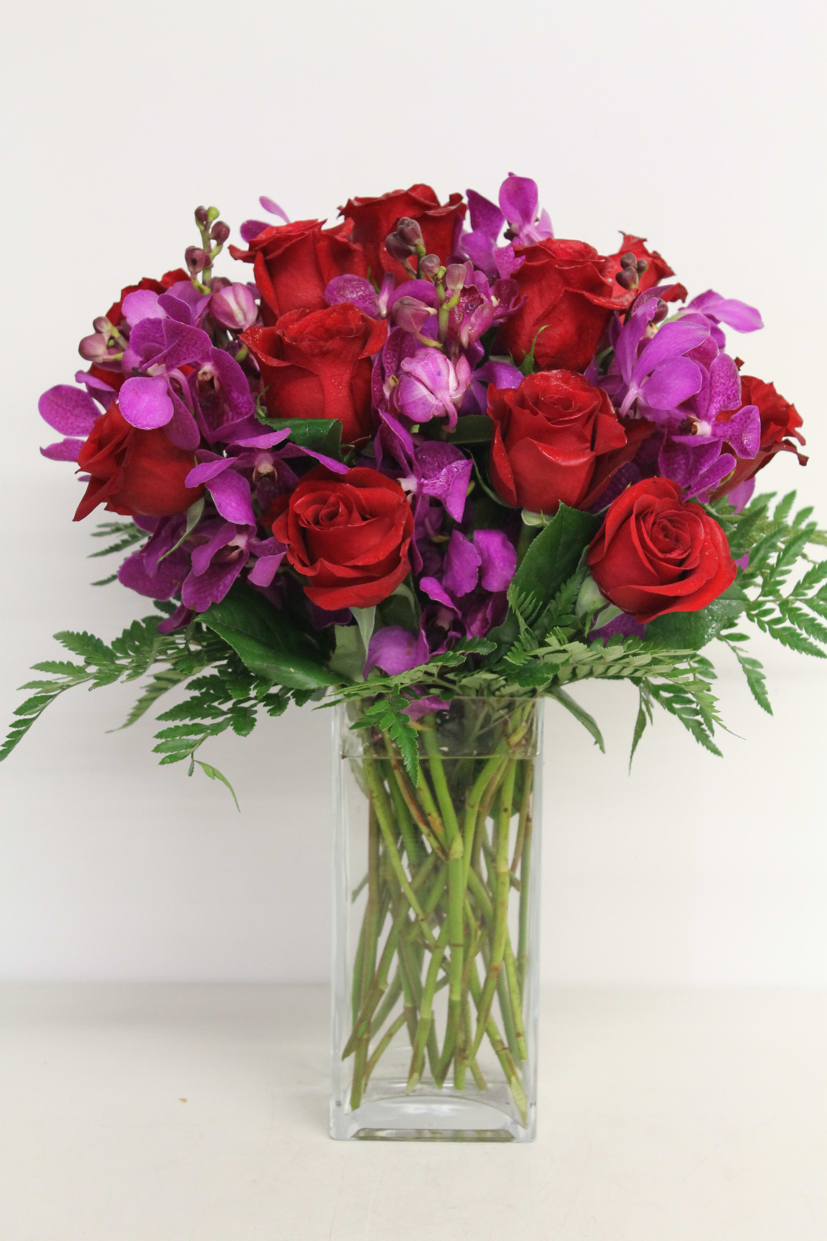 Orchid And Rose Bouquet By The Flower Lover