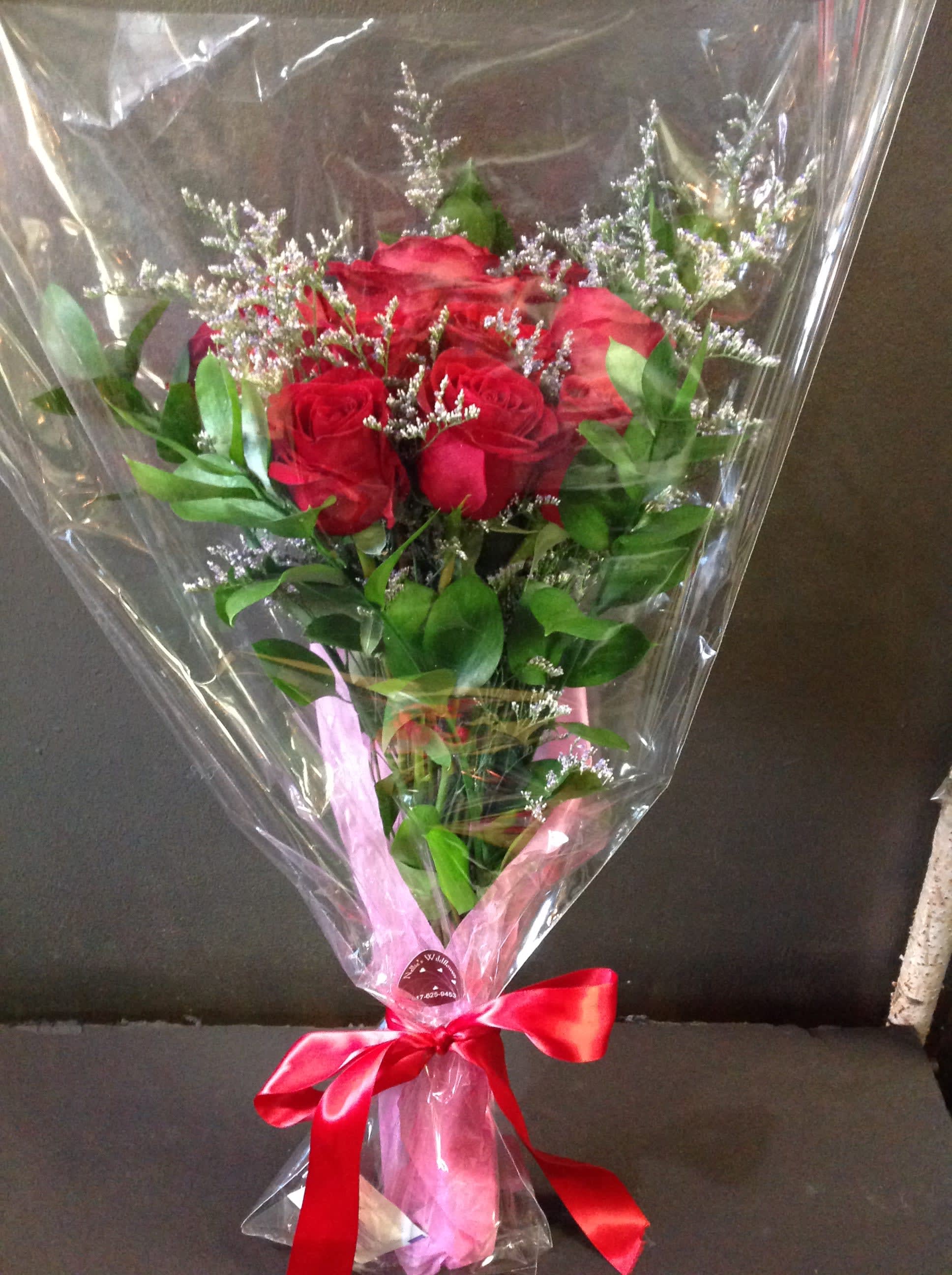 Dozen Roses Loose Wrap In Somerville Ma Nellie S Wildflowers
