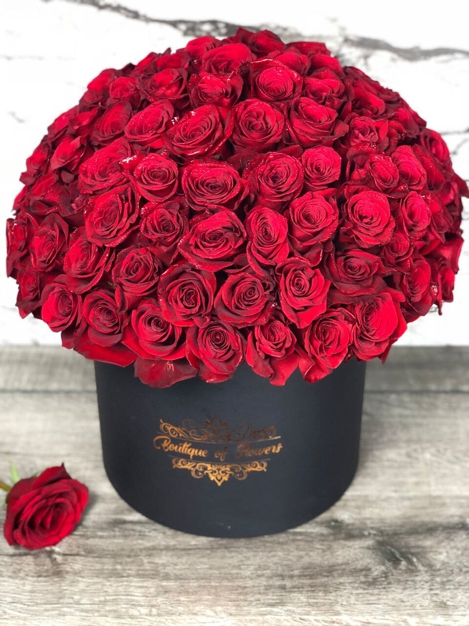 8 Dozen Red Roses On Round Box By Rubi S Flower Shop