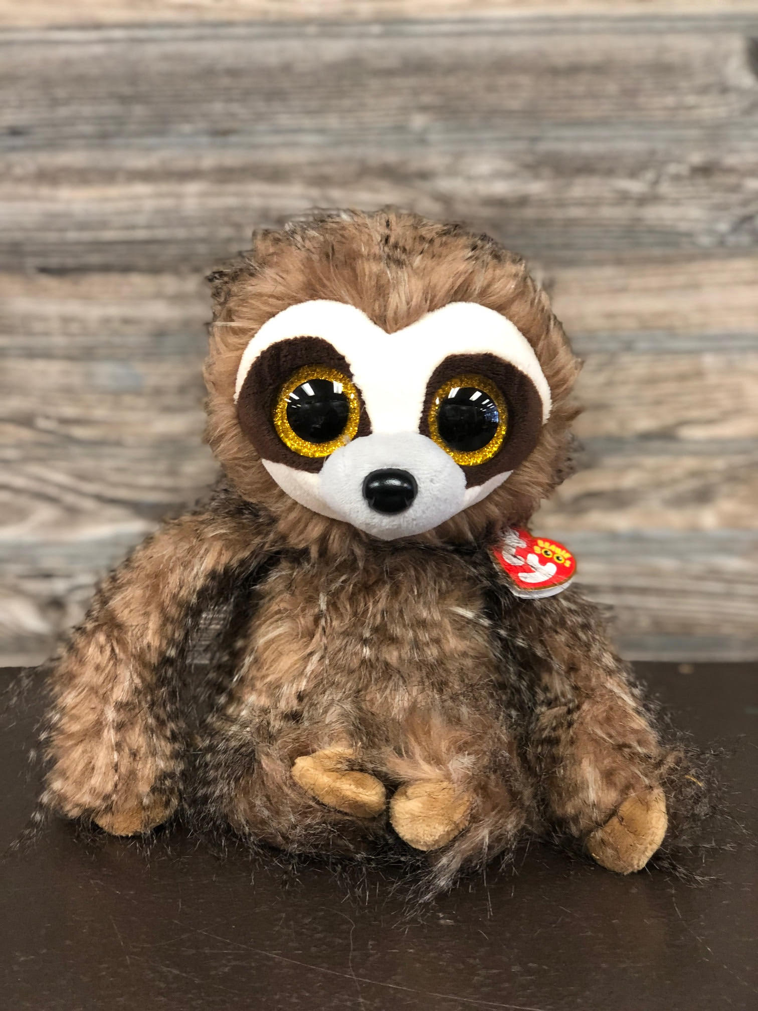 stuffed sloth toy