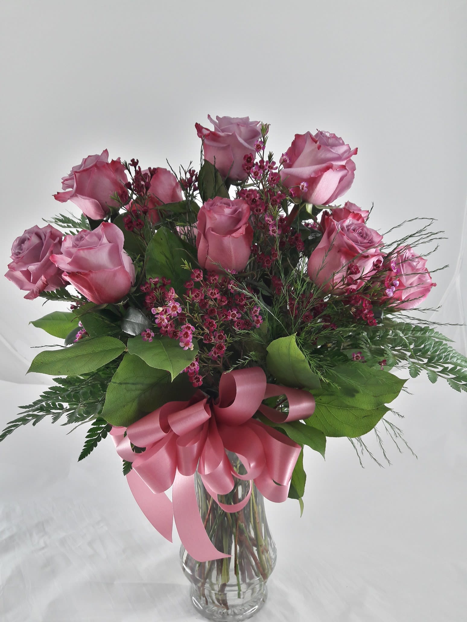 A Dozen Lavender Roses In Melbourne Fl Buds Bows Floral Design