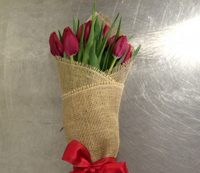 wrapped tulips - 10 tulips wrapped in burlap and tied with matching color silk ribbon