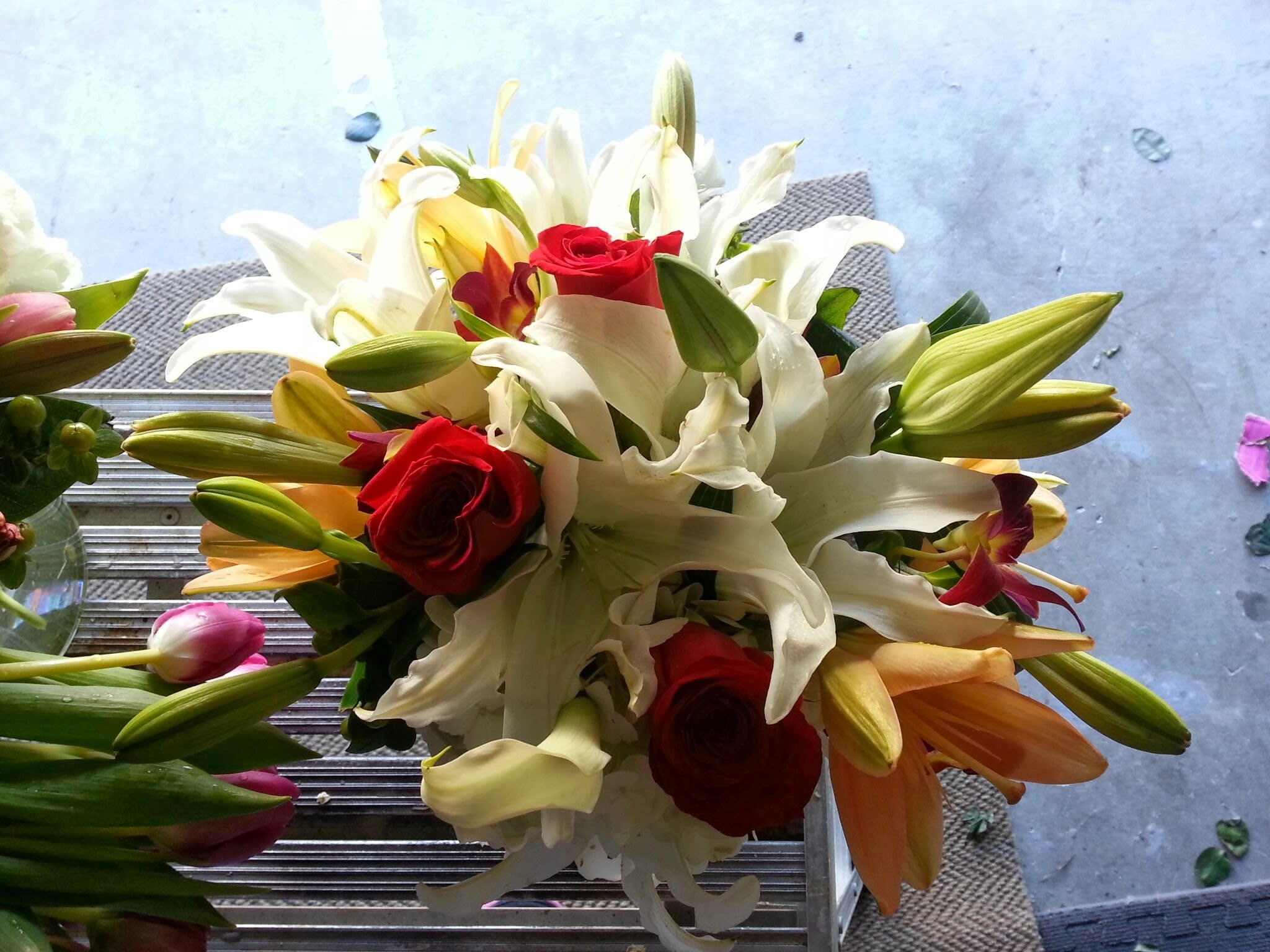 Lilyanne Lilyanne - Oriental lilies, asiatic lilies, roses, dendrobium orchids designed into clear glass vase