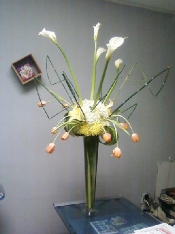 Tulips Deco' - Intrique one of a kind design with mix calla lilies, tulips and other flowers arrangement on a tall vase 