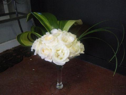 After Hour - White roses in a Champagne glass vase
