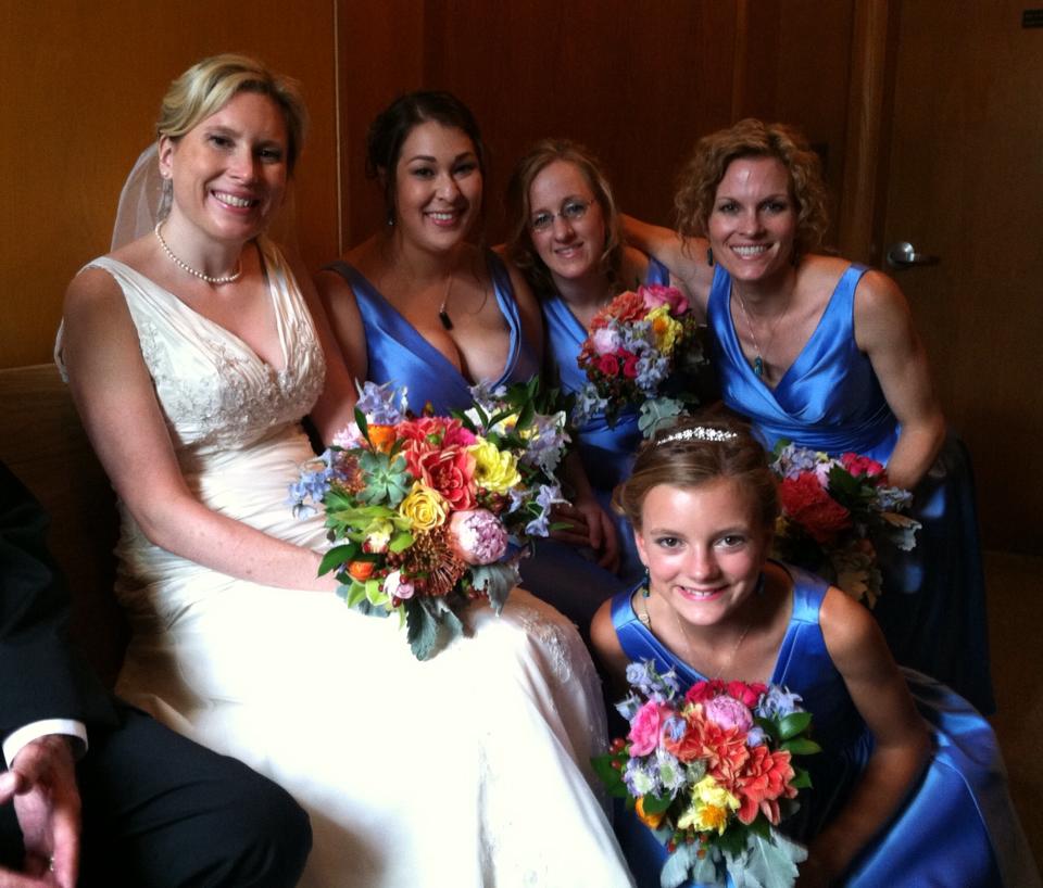 Mid Summer Bridal Bouquet Mid Summer Bridal Bouquet - Vibrant summer blooms with Dahlia, Ranunculus, Peony and Gerbera are hand-tied into a lovely bouquet ready to walk down the aisle.