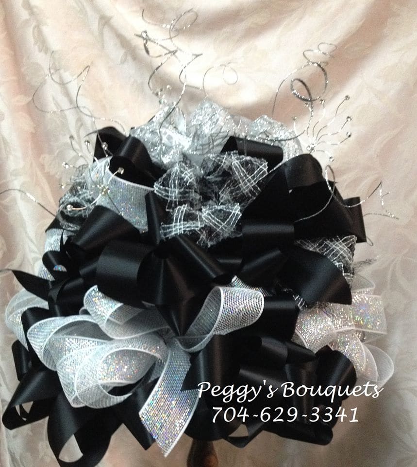 Car Bow - Beautiful car bows for your new graduate.  Colors and Sizes vary based on customer design.  Can be embellished with jewels, feathers and other added bling.