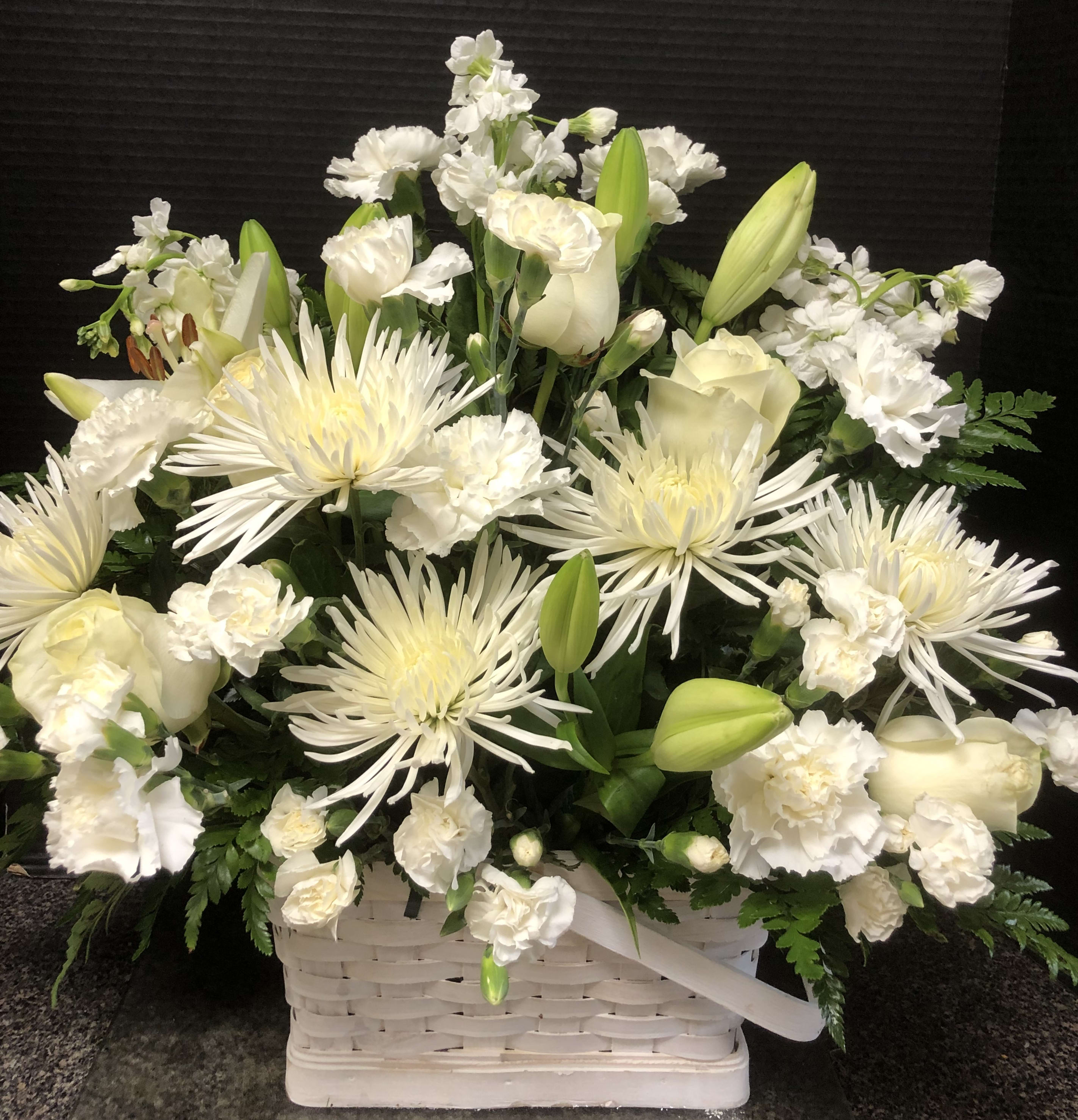 Mixed seasonal flowers - Mixed seasonal flowers in a basket . Please specify colors in instructions. Medium basket in pic