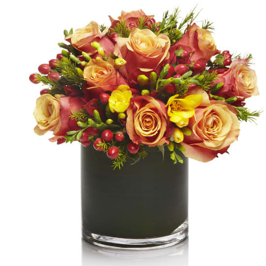 Orange Sherbet - Orange Roses, Freesias and Hypericums in a Vibrant and Elegant Mix.