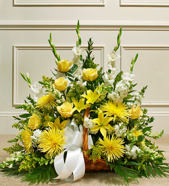 Thoughts and Prayers Fireside Basket - Yellow - Product ID: 91205   This touching tribute is a tasteful expression of your sympathy and support. Long stem yellow roses and Asiatic lilies, white gladiolas and snapdragons, and more are arranged in a fireside basket by our expert floral designers Traditionally sent by family, friends or business associates Delivered directly to the funeral home Our florists use only the freshest flowers available so varieties and colors may vary Measures approximately 26âH x 36âL