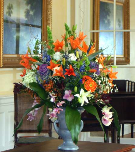 Premium Luxury Garden Urn Premium Luxury Garden Urn - This gift is designed to impress. Our designer hand selects our finest blooms from today's fresh cuts and exquisitely designs them in a luxurious urn. Exact colors and varieties will depend on daily availability. Each one is created to be unique and absolutely breathtaking.