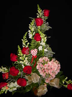 red doses - mini roses and regular roses in a basket.