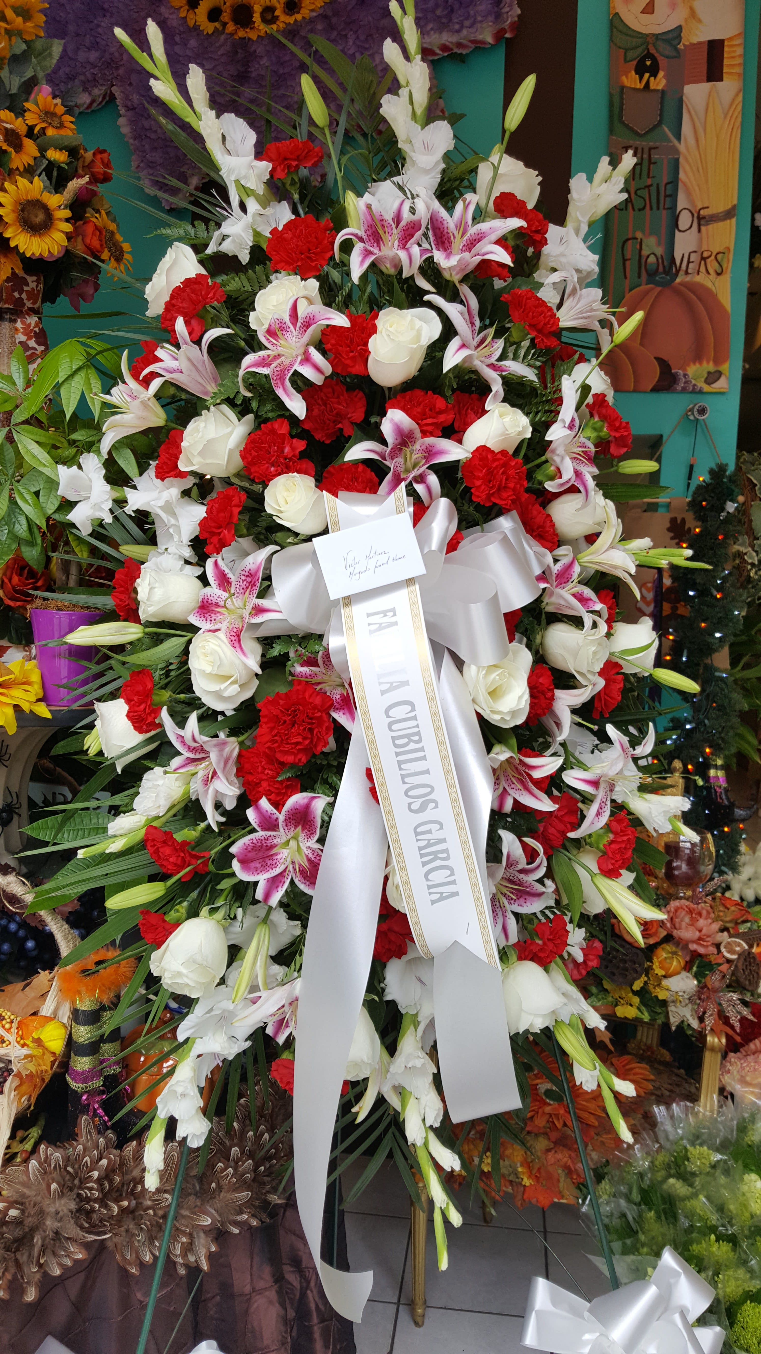 mix spray - pink lilies, red carnations, white gladilos and white roses