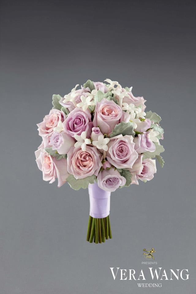 VWM2 - The Ever in Love™ VWM2 - The Ever in Love™ - Bouquet by Vera Wang is a truly romantic bouquet to give that extra special touch to your fairytale beginning. Lavender roses and spray roses are accented with white stephanotis and dusty miller stems beautifully tied together with a lavender grosgrain ribbon to get you to look your bridal best on your special day.
