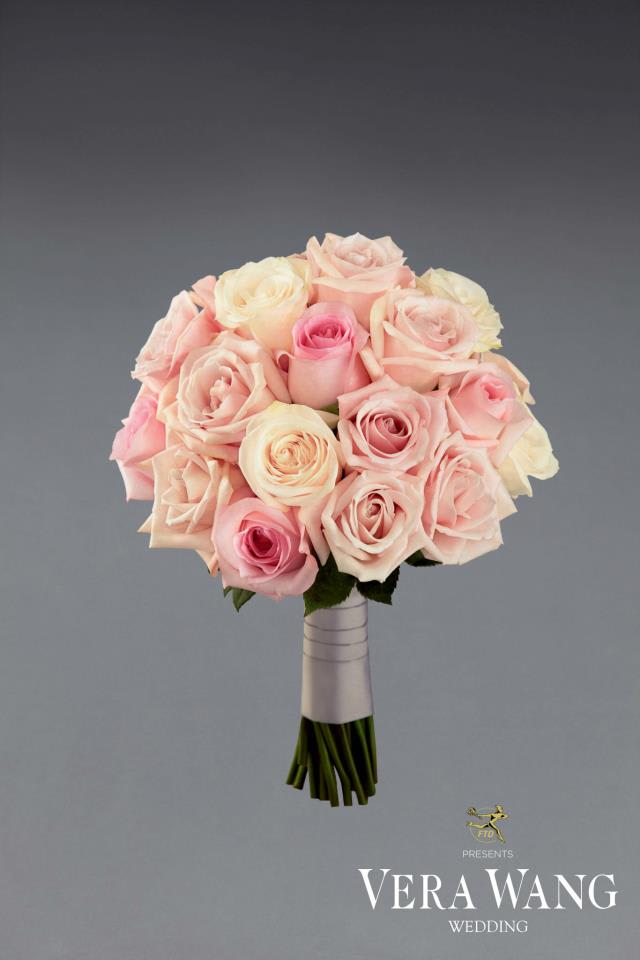 VWR7- The Unforgettable Day™ VWR7- The Unforgettable Day™ - The Unforgettable Day™ Bouquet by Vera Wang will make your wedding entrance memorable to each and every one of your wedding guests. Gorgeous assorted pink roses and cream roses are clustered together to create a display of swirling beauty, tied together at the stems with a silver gray grosgrain ribbon, to make you look your bridal best.