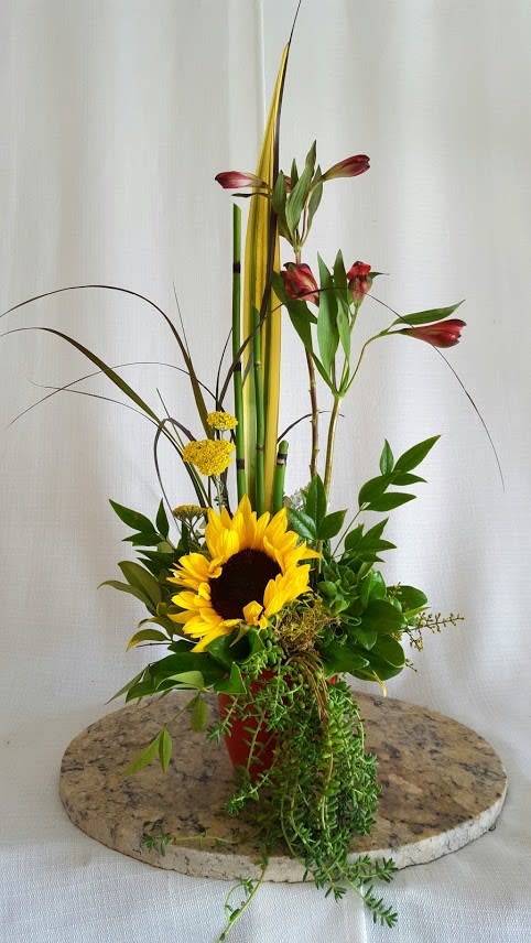 Elegant Journey - This simple yet elegant floral design gives wonderful presentation for many occasions.  Tall and slender in its appearance, the creation is suitable for a variety of locations wherever it is delivered.