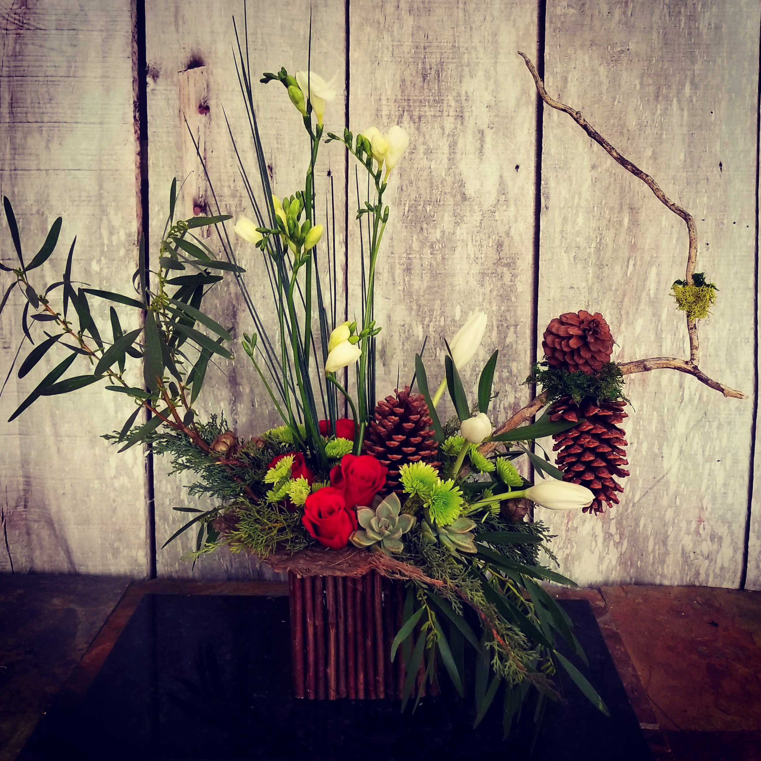 Contemporary Holiday - This unique floral design send well wishes for family, friend and business, any relationships. Natural touches for that organic presence!