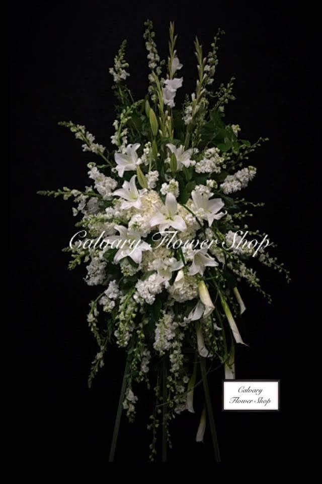 All White Sympathy Standing Spray W Callalilies By Calvary Flower Shop