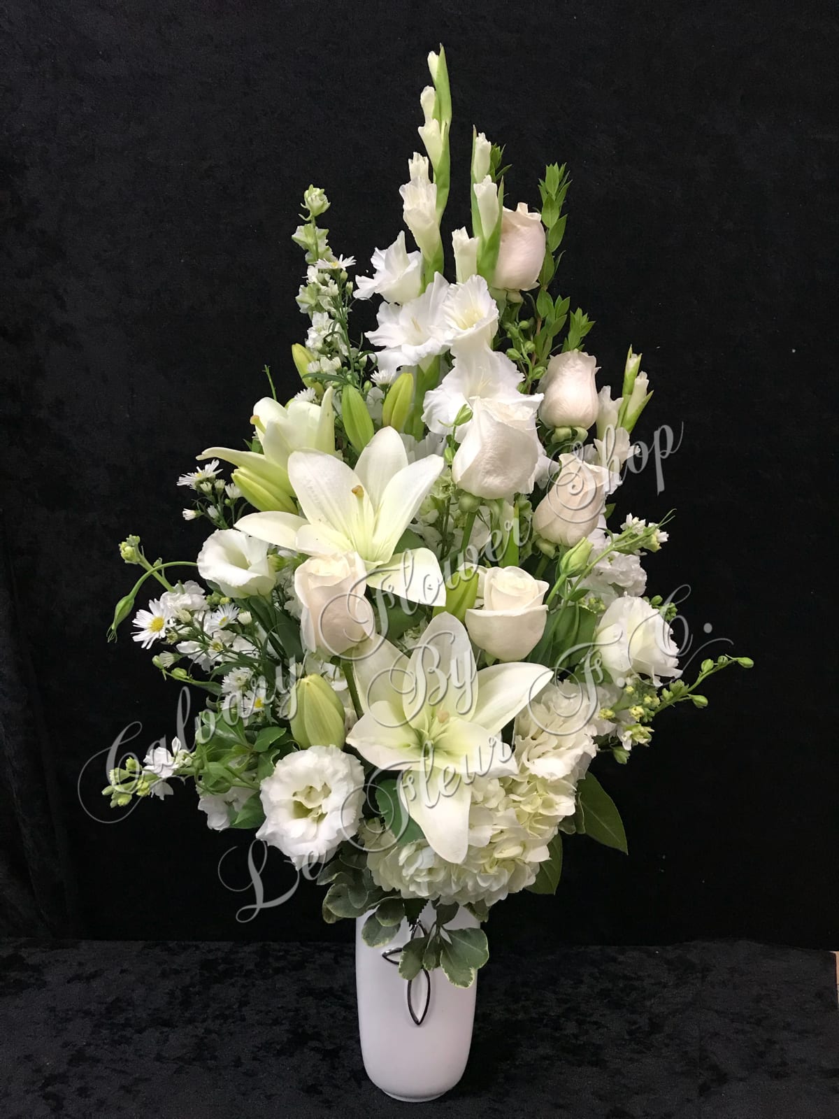 All White Sympathy Vase Arrangement In Los Angeles Ca Calvary Flower Shop Funeral flowers from interflora, expertly prepared and delivered for free on the next day. all white sympathy vase arrangement in los angeles ca calvary flower shop