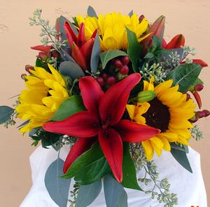 Sunflowers and Lillies - Sunflowers with non-fragrant lillies in 6&quot; bowl.