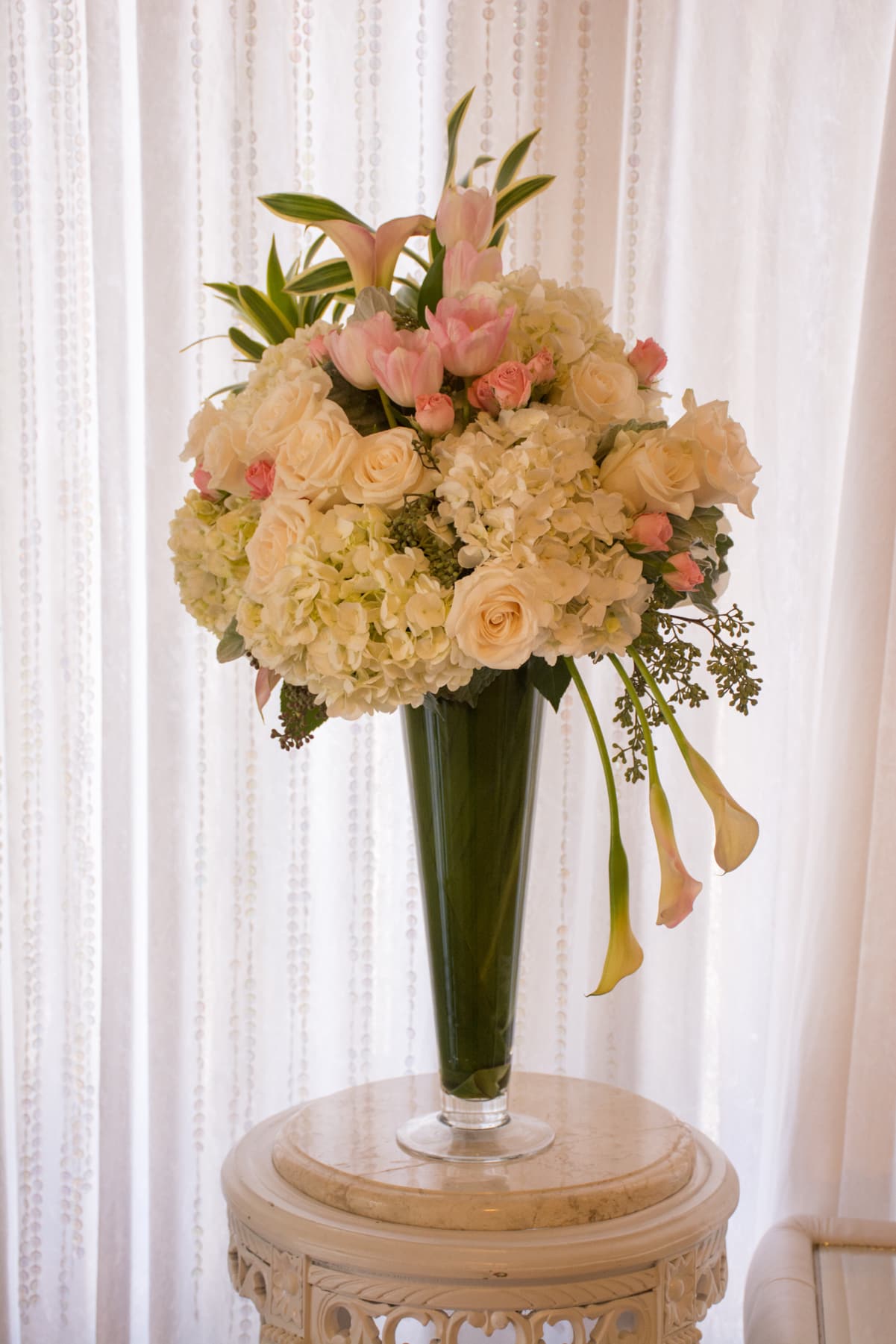 Sasha Sasha - tall vase filled with spring color flowers