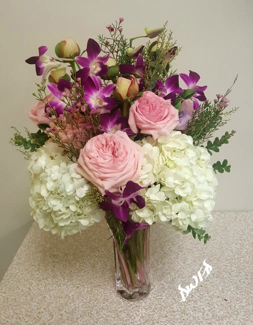 Exquisite Plush Bouquet - Dream World Florist &amp; Decor presents an exquisite bouquet of hydrangea, peonies, garden roses, wax flowers and orchids. Elegant and enchanting