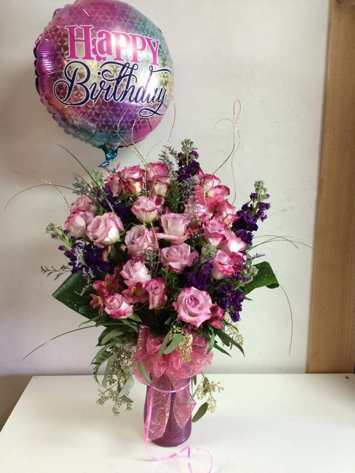 Two Dozen Two Tones - Two Dozen Bi-colored Roses and a balloon! A colored glass vase and sparkly ting!  Wow!  Please specify occasion for balloon.