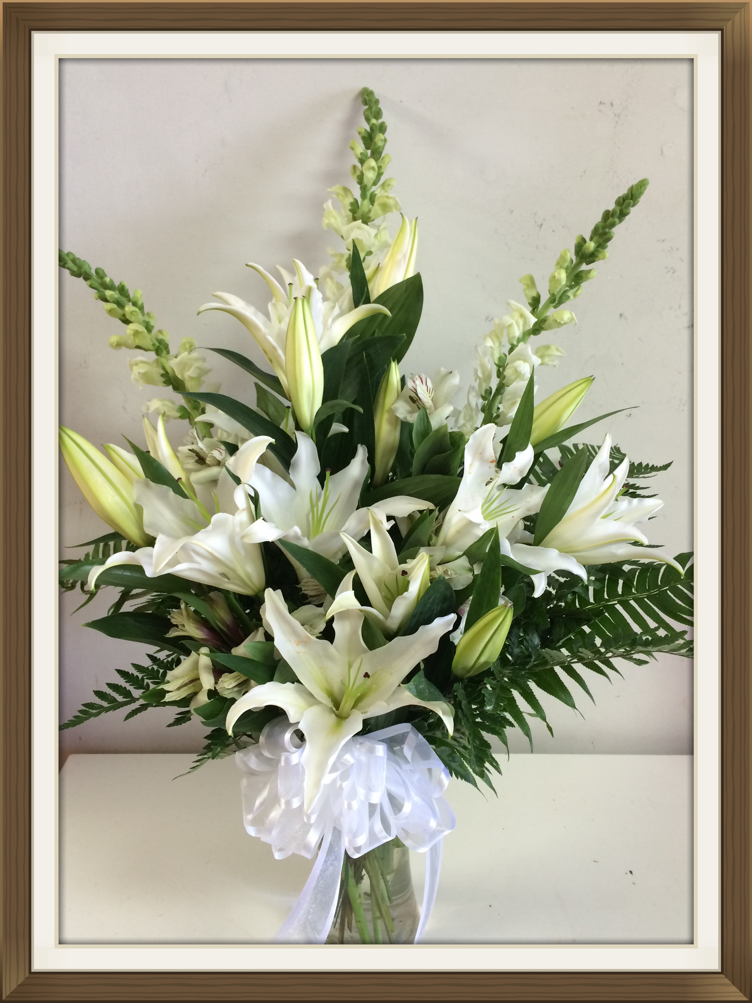 ALL WHITE - All white lilys, alstromeria and snapdragons for a very clean elegant look.